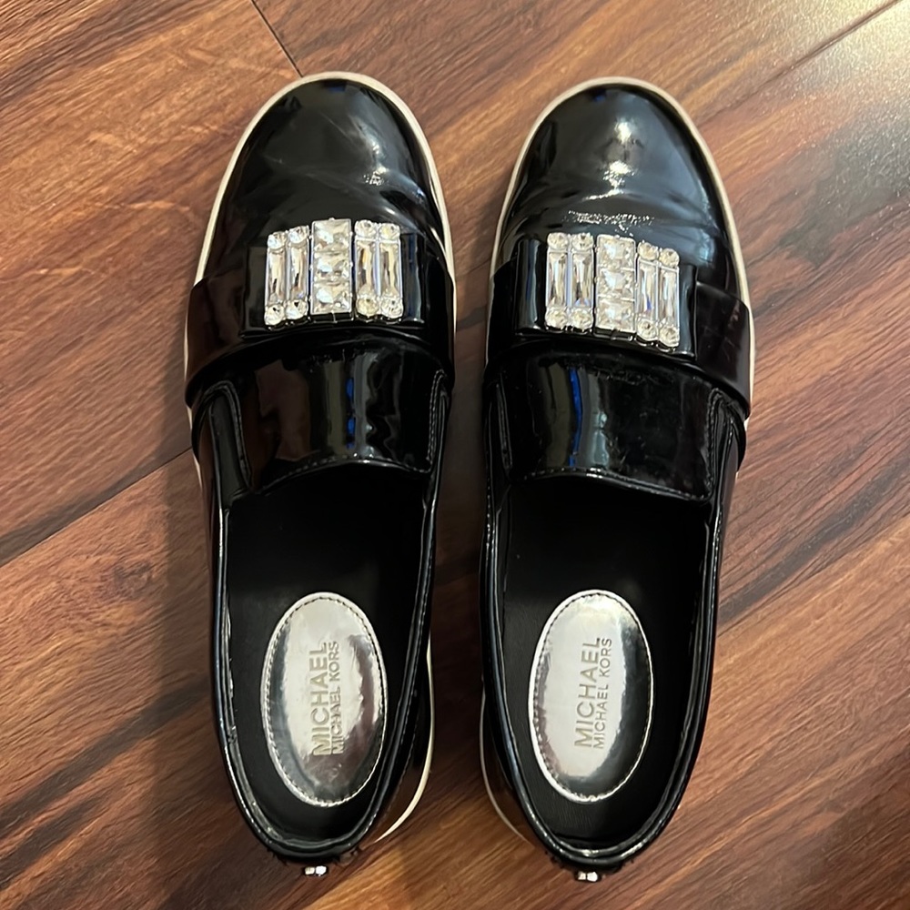 Michael Kors Patent Leather Sneakers. Worn but in overall good condition.